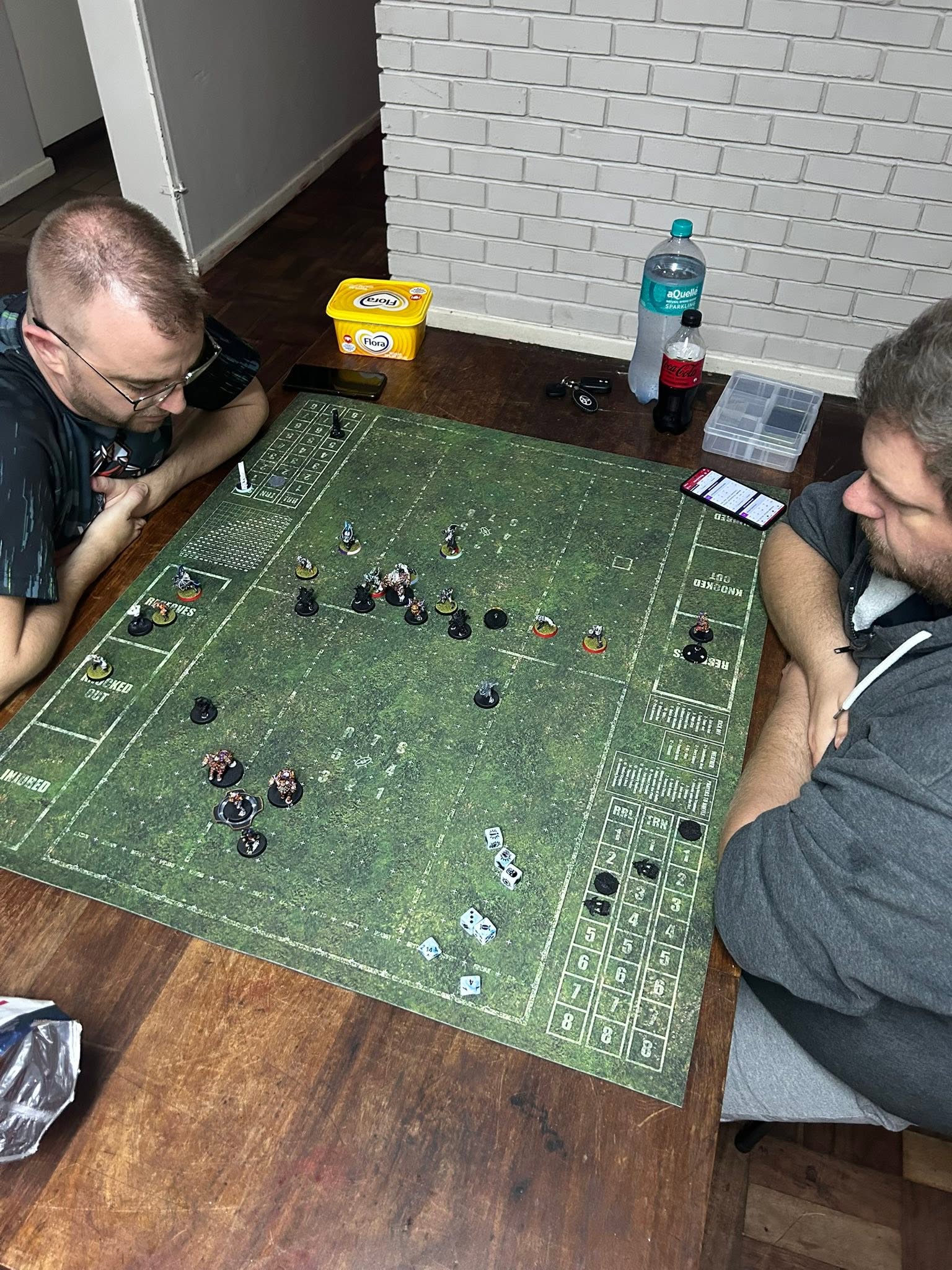 Members playing across multiple tables in the club hall